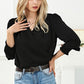 Black Solid Surplice Neck Shirred Cuffs Draped Blouse